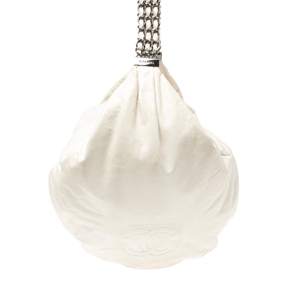 Authentic “CHANEL” lambskin Rock & Chain bag. Gently used. OFF WHITE/CREME color